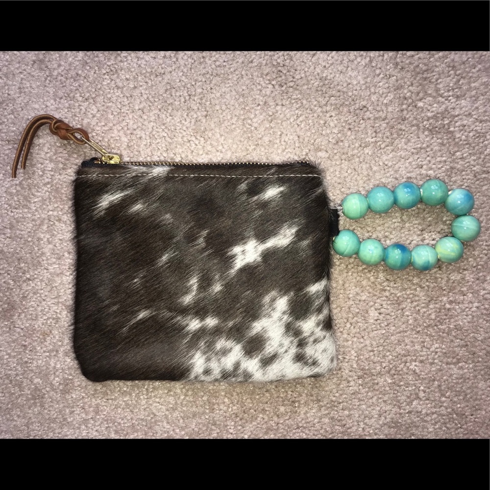 Cowhide wristlet with turquoise beads